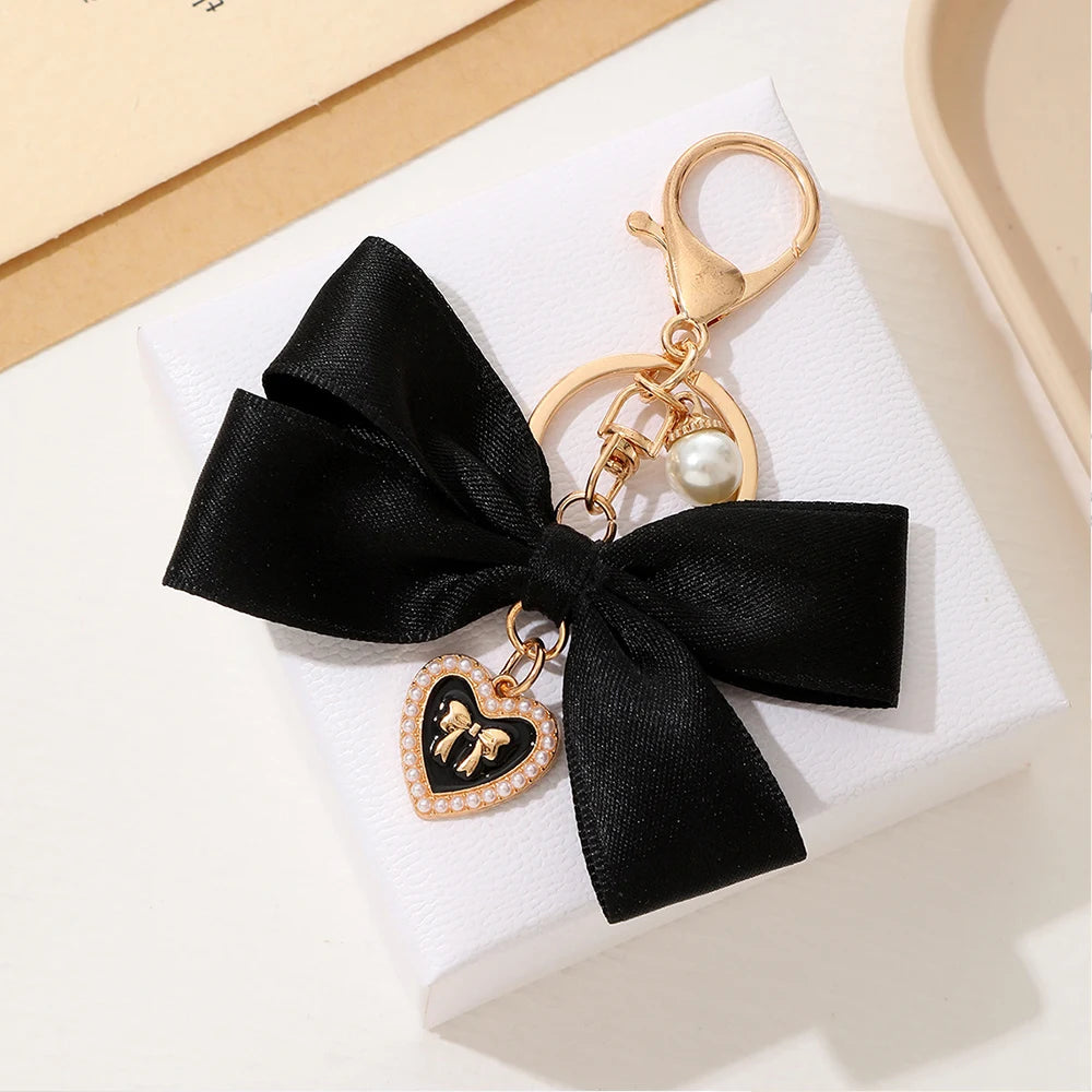 Kawaii Imitation Pearl Keychain πΈ Cute Ribbon Bowknot Bag Charm π Stylish Metal Buckle Accessory for Women π Perfect Gift Jewelry