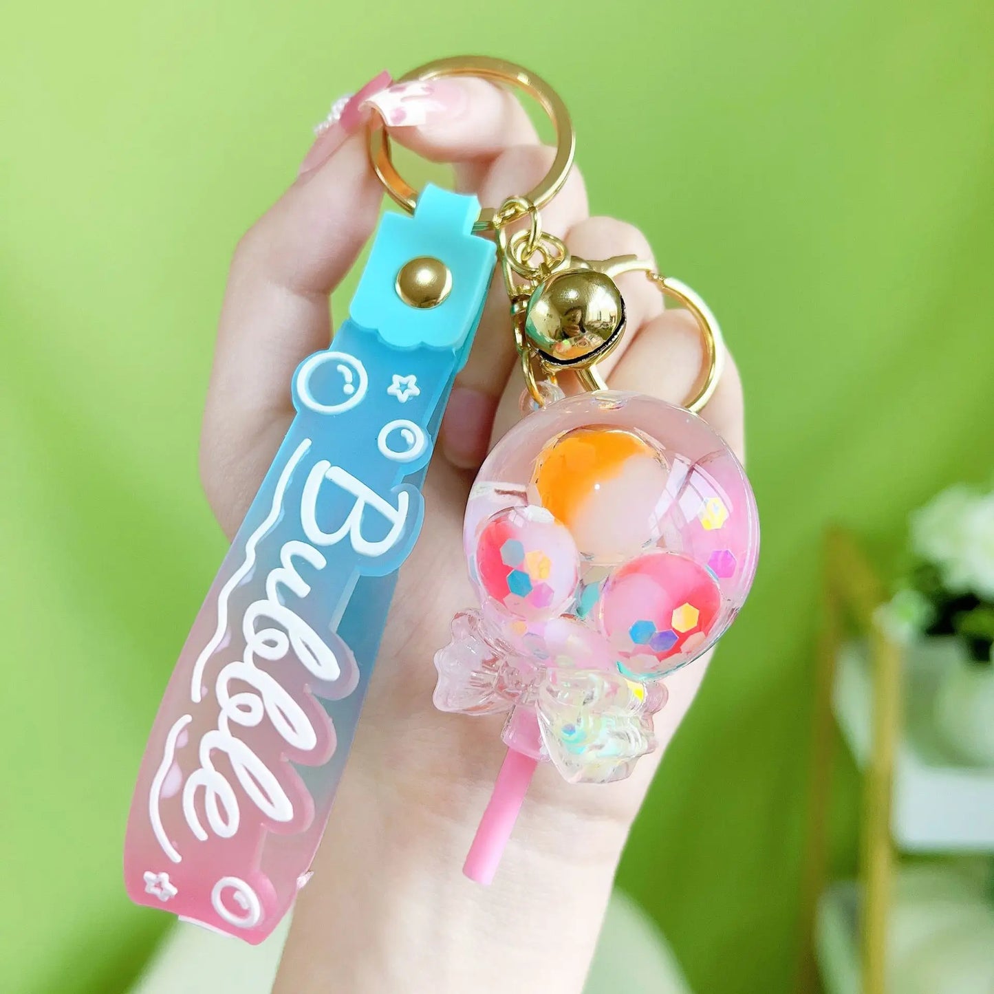 β¨ Adorable Luminous Bubble Beads Keychain π¬ Cute Quicksand Cherry Blossom Lollipop Pendant for Trendy Bags π Perfect Gift for All! - Pixie Quill
