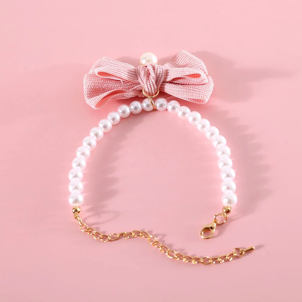 β¨ Sparkling Pet Pearl Collar with Adorable Bowtie π - Bling Jewelry for Your Furry Friends! πΎ