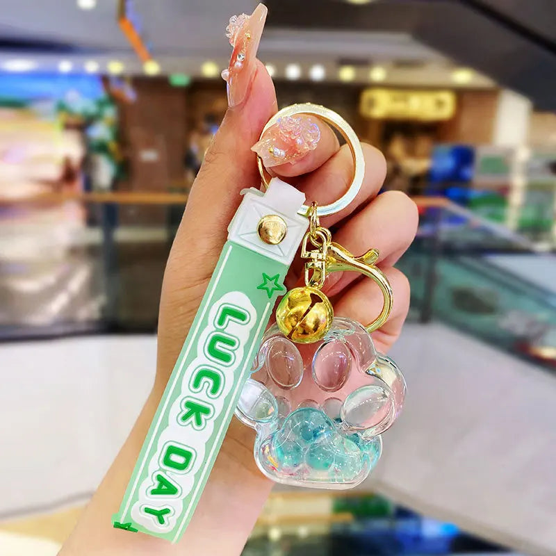 β¨ Cute Cat Claw Bubble Bead Liquid Flowing Sand Keychain Pendant π Perfect Friendship Gift for All! πΎ - Pixie Quill