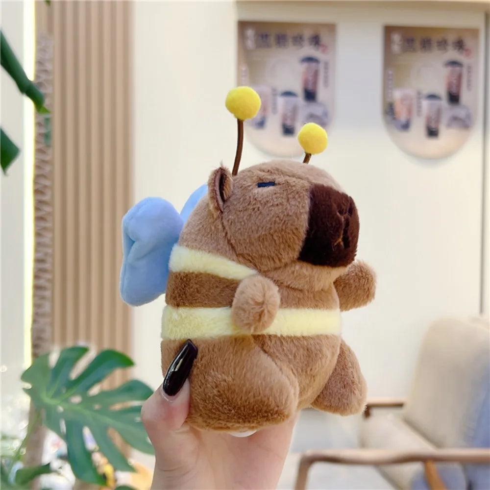 Kawaii Brown Capybara Keychain 🐹✨ Adorable Plush Doll with Funny Fluttering Wings - Perfect Bag Pendant! 🎉
