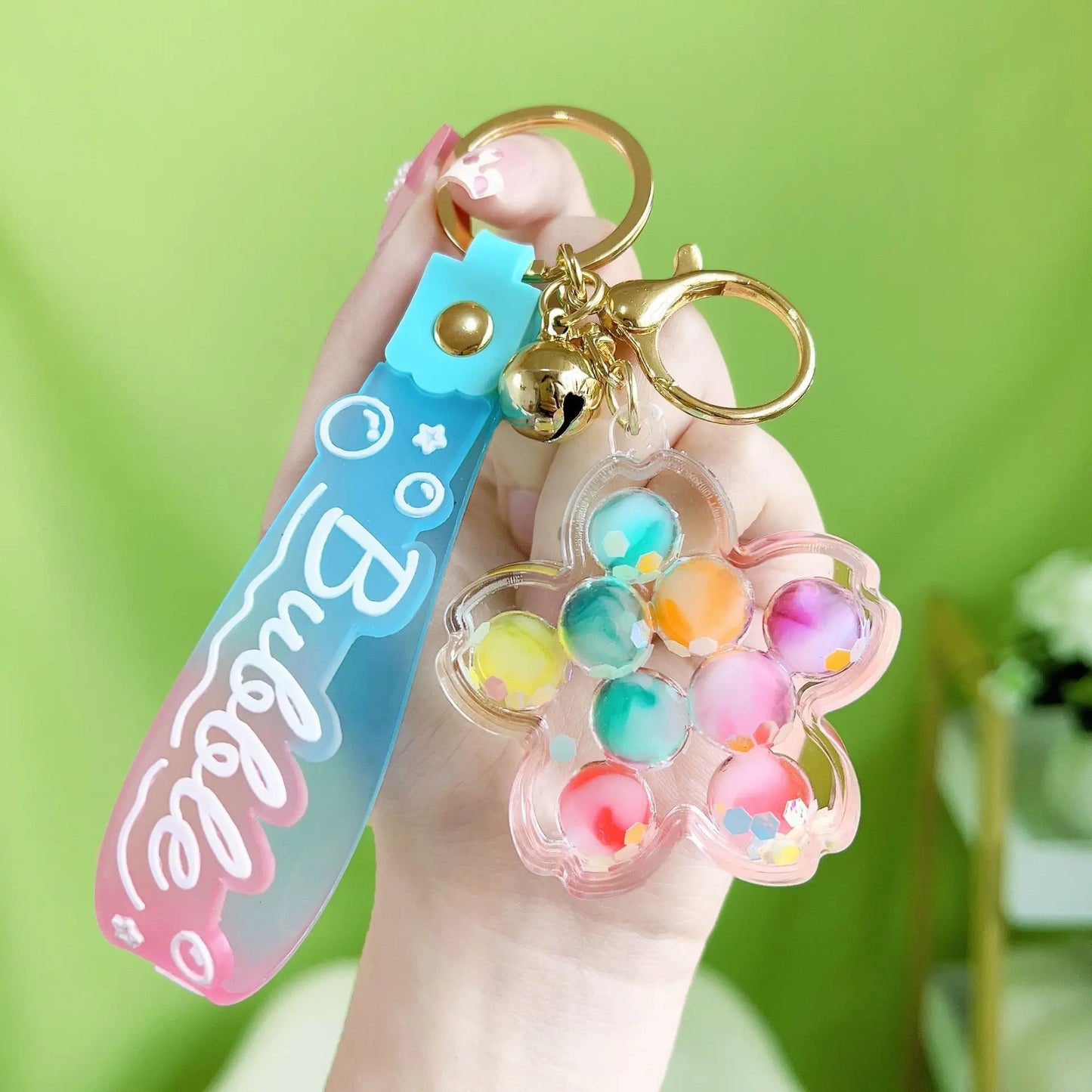 β¨ Adorable Luminous Bubble Beads Keychain π¬ Cute Quicksand Cherry Blossom Lollipop Pendant for Trendy Bags π Perfect Gift for All! - Pixie Quill