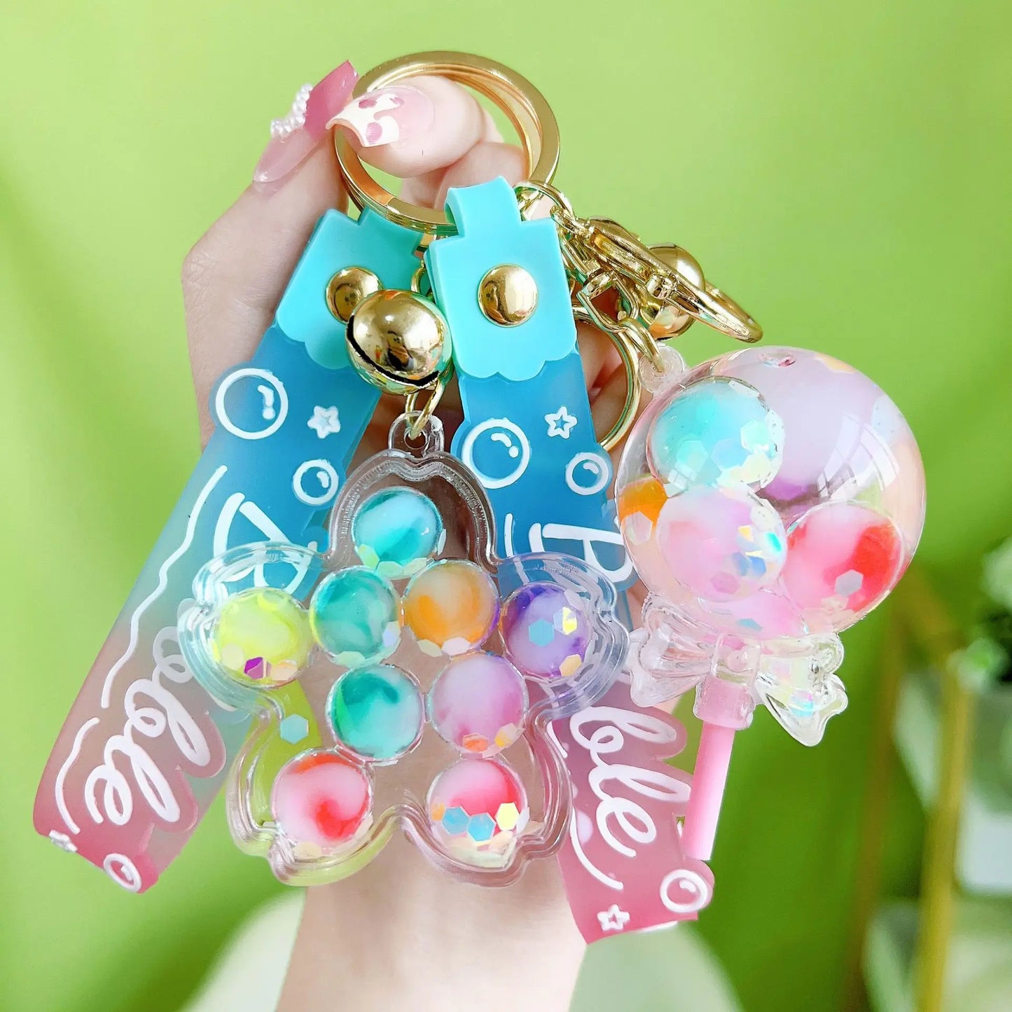 β¨ Adorable Luminous Bubble Beads Keychain π¬ Cute Quicksand Cherry Blossom Lollipop Pendant for Trendy Bags π Perfect Gift for All! - Pixie Quill
