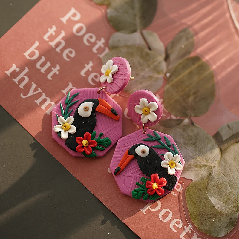 Bright Tropical Toucan Parrot Dangle Earrings Set in Floral Jungle Colors Polymer Clay Jewelry for Summer Fun 🐦🌺🌴