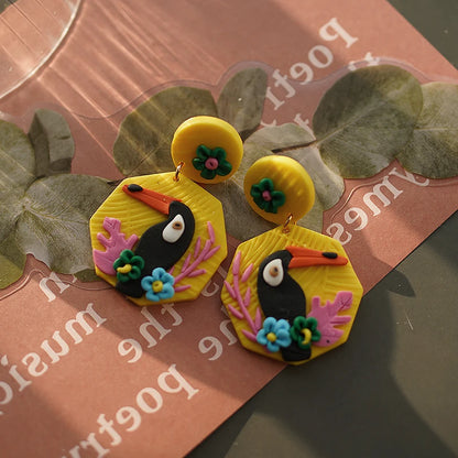 Bright Tropical Toucan Parrot Dangle Earrings Set in Floral Jungle Colors Polymer Clay Jewelry for Summer Fun 🐦🌺🌴
