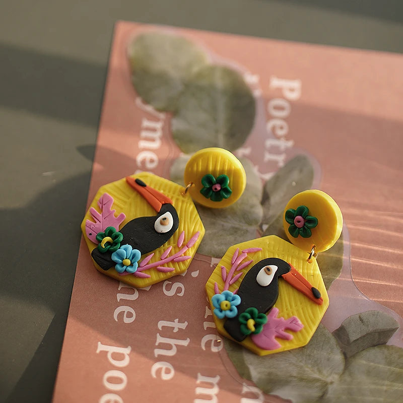 Bright Tropical Toucan Parrot Dangle Earrings Set in Floral Jungle Colors Polymer Clay Jewelry for Summer Fun 🐦🌺🌴