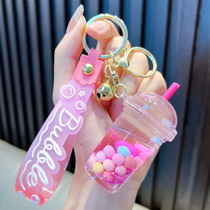 ✨ Adorable Quicksand Jelly Bean Keychain 🌈 - Whimsical Liquid Pearl Milk Tea Pendant for Trendy Bags & Keys! 🎀 - Pixie Quill