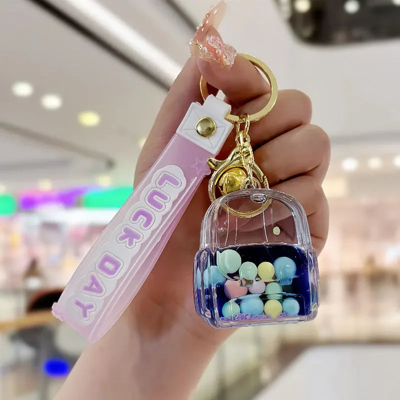 Adorable Cartoon Cat Claw Keychain 🌟✨ Floating Liquid Sand & Couples Pendant for Fun Car & Bag Decor! 🐾❤️ - Pixie Quill