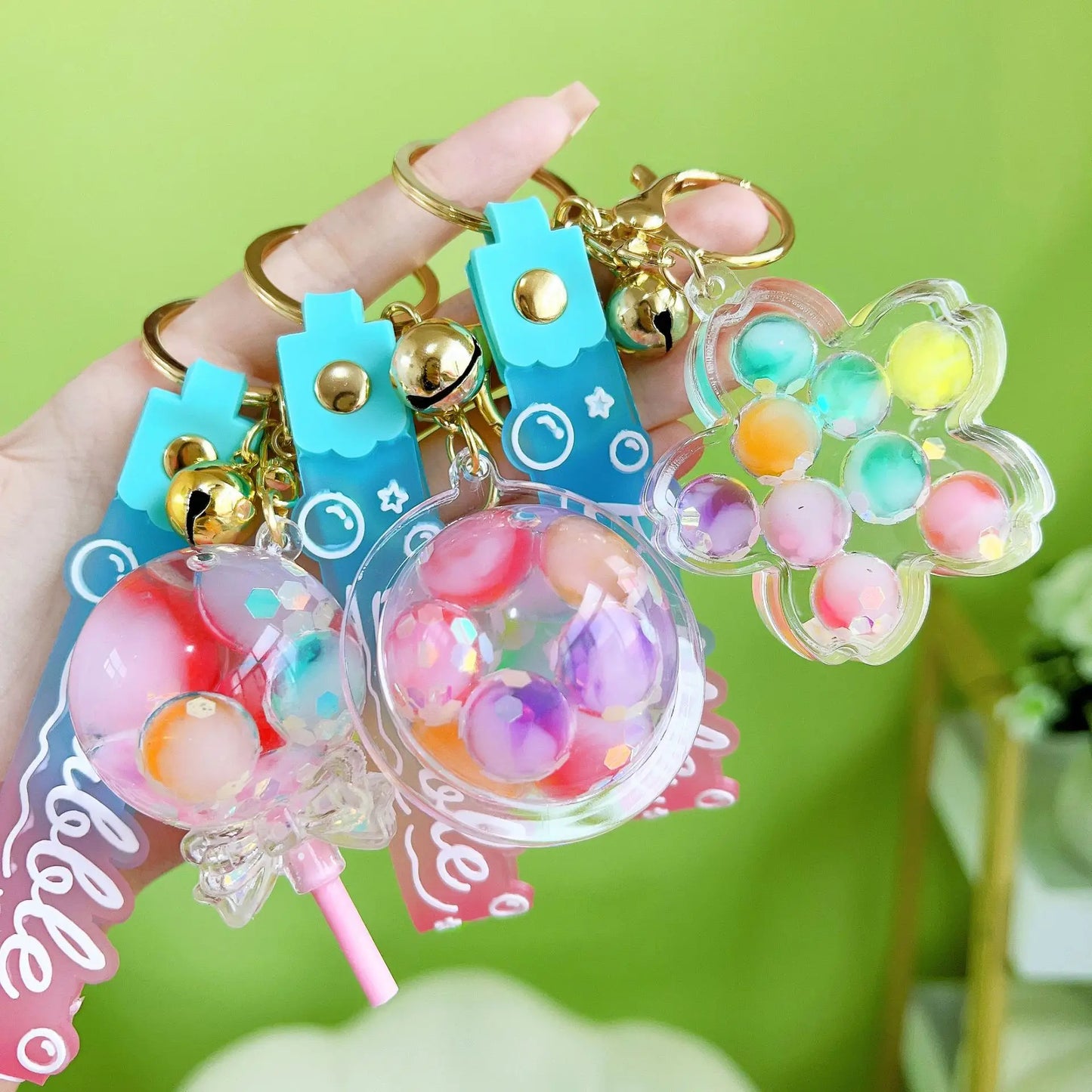 ✨ Adorable Luminous Bubble Beads Keychain 🍬 Cute Quicksand Cherry Blossom Lollipop Pendant for Trendy Bags 🎀 Perfect Gift for All! - Pixie Quill