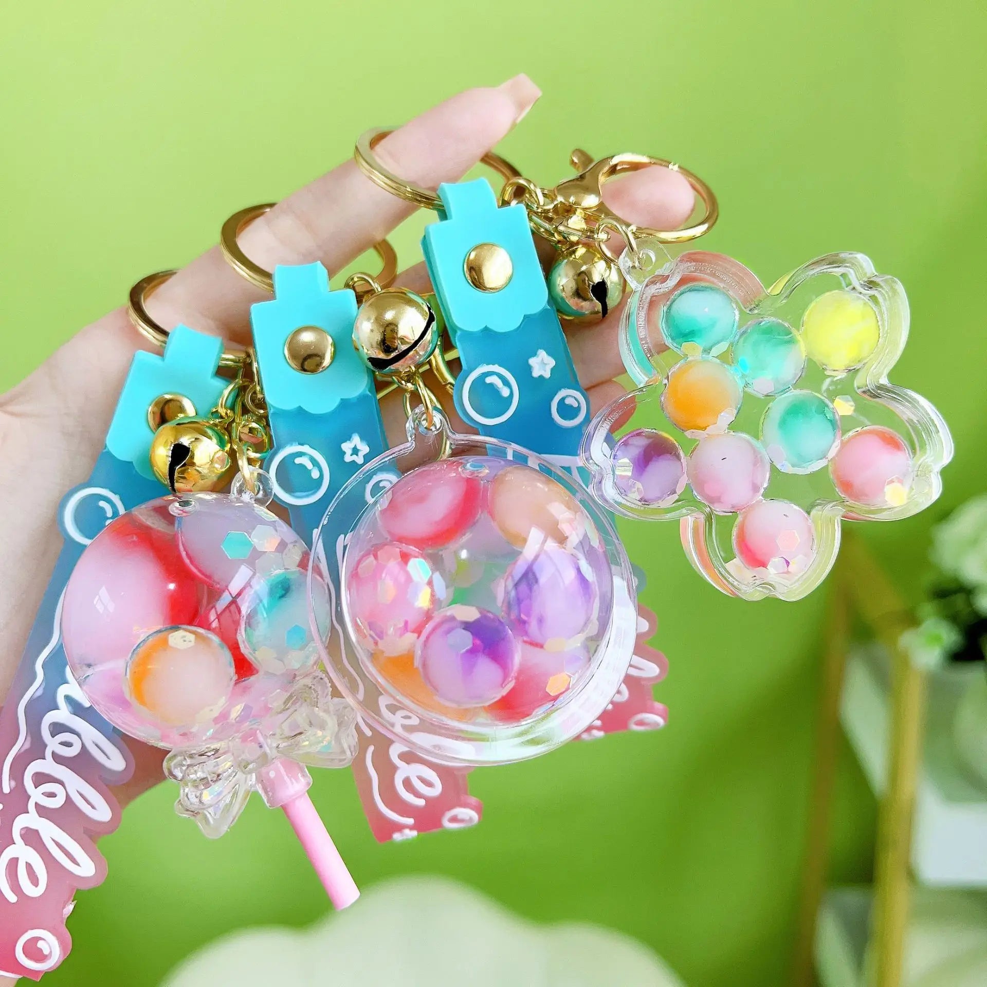 ✨ Adorable Luminous Bubble Beads Keychain 🍬 Cute Quicksand Cherry Blossom Lollipop Pendant for Trendy Bags 🎀 Perfect Gift for All! - Pixie Quill