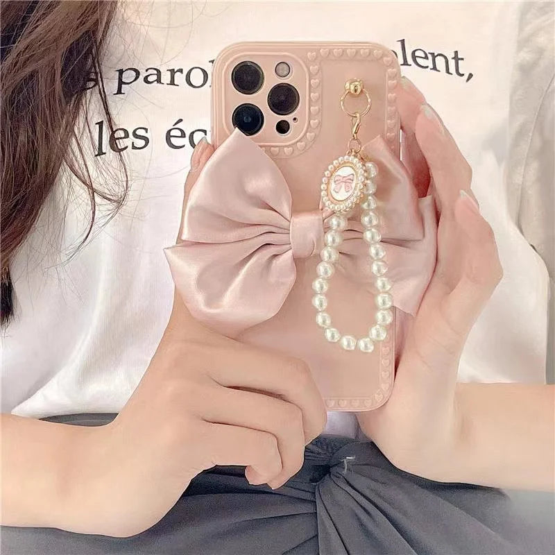 Kawaii Elegance: 3D Bow & Pearl Bracelet Soft Case for iPhone ✨💕