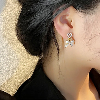 🌸 Adorable Pearl Bow Dangle Earrings 🎀 - Playful Vintage Charm for Fashionistas! 💖 Ideal for Celebrations & Sweet Surprises! 🎊 - Pixie Quill