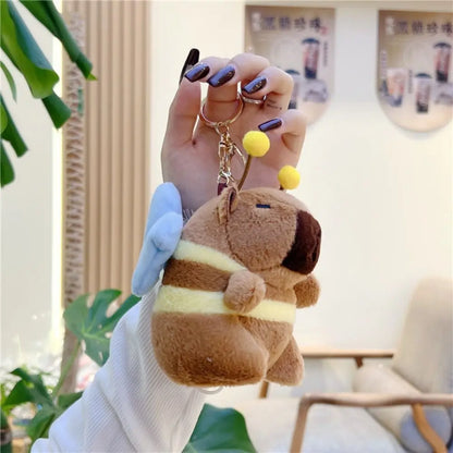 Kawaii Brown Capybara Keychain 🐹✨ Adorable Plush Doll with Funny Fluttering Wings - Perfect Bag Pendant! 🎉