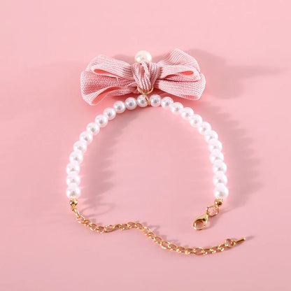 ✨ Sparkling Pet Pearl Collar with Adorable Bowtie 💖 - Bling Jewelry for Your Furry Friends! 🐾