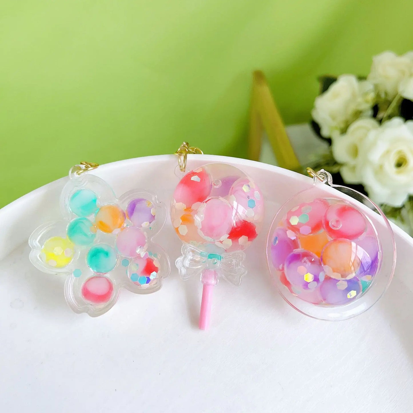 ✨ Adorable Luminous Bubble Beads Keychain 🍬 Cute Quicksand Cherry Blossom Lollipop Pendant for Trendy Bags 🎀 Perfect Gift for All! - Pixie Quill