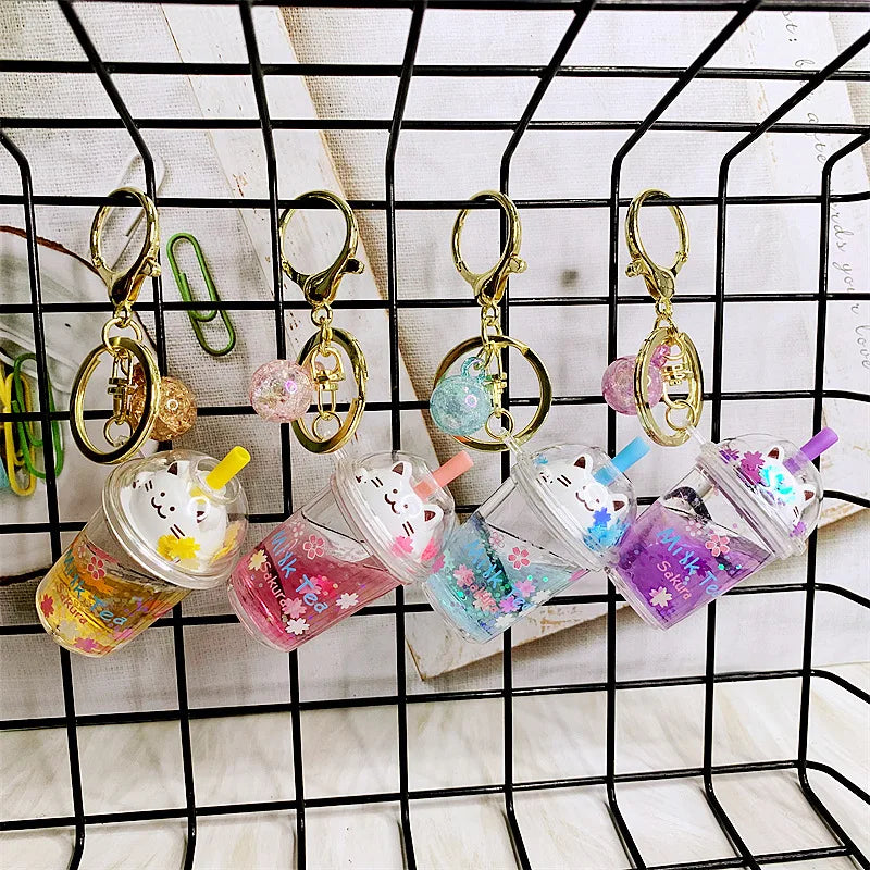 🌸 Cute Cat Milk Tea Keychain 🐱✨ Adorable Sakura Car Pendant Gift! - Pixie Quill