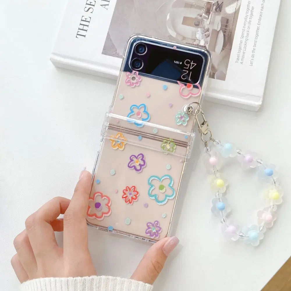 🌸✨Cute Floral Charm Case for Samsung Z Flip 6/5/4/3 - Adorable Transparent Design with Bracelet! 💖📱