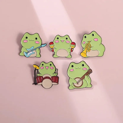 Kawaii Cartoon Frog Band Enamel Pins 🎶🐸 | Fun Drum & Guitar Brooches for Kids & Friends 🎸✨ | Cute Lapel Badges & Jewelry Gift