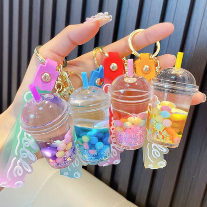 ✨ Adorable Quicksand Jelly Bean Keychain 🌈 - Whimsical Liquid Pearl Milk Tea Pendant for Trendy Bags & Keys! 🎀 - Pixie Quill