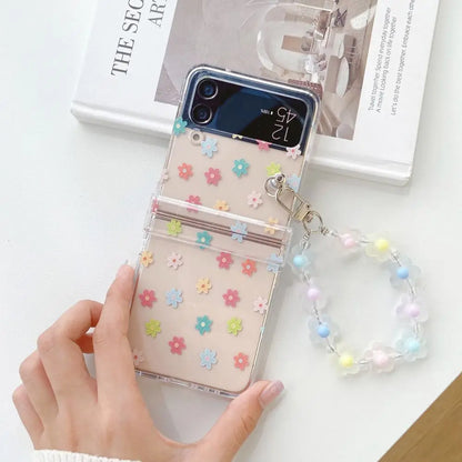 🌸✨Cute Floral Charm Case for Samsung Z Flip 6/5/4/3 - Adorable Transparent Design with Bracelet! 💖📱
