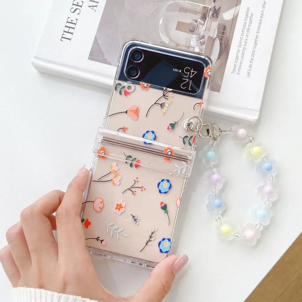 🌸✨Cute Floral Charm Case for Samsung Z Flip 6/5/4/3 - Adorable Transparent Design with Bracelet! 💖📱
