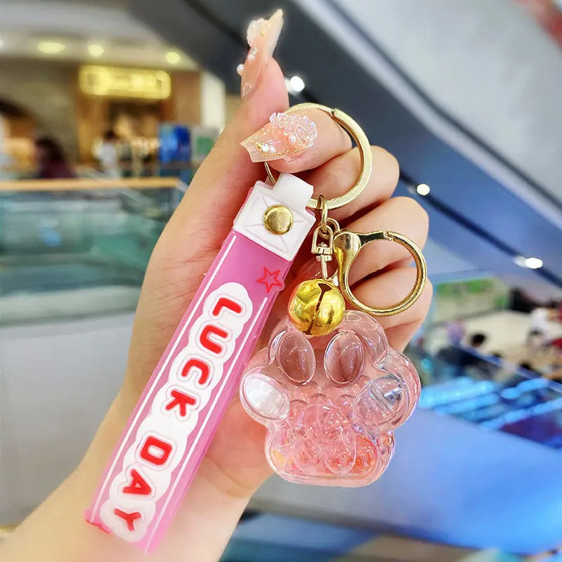 ✨ Cute Cat Claw Bubble Bead Liquid Flowing Sand Keychain Pendant 🌈 Perfect Friendship Gift for All! 🐾 - Pixie Quill