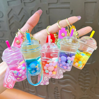 ✨ Adorable Quicksand Jelly Bean Keychain 🌈 - Whimsical Liquid Pearl Milk Tea Pendant for Trendy Bags & Keys! 🎀 - Pixie Quill