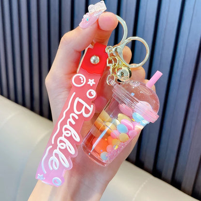 ✨ Adorable Quicksand Jelly Bean Keychain 🌈 - Whimsical Liquid Pearl Milk Tea Pendant for Trendy Bags & Keys! 🎀 - Pixie Quill