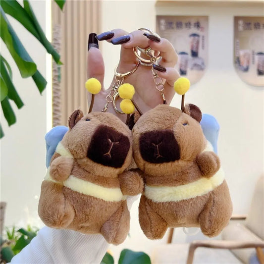 Kawaii Brown Capybara Keychain 🐹✨ Adorable Plush Doll with Funny Fluttering Wings - Perfect Bag Pendant! 🎉