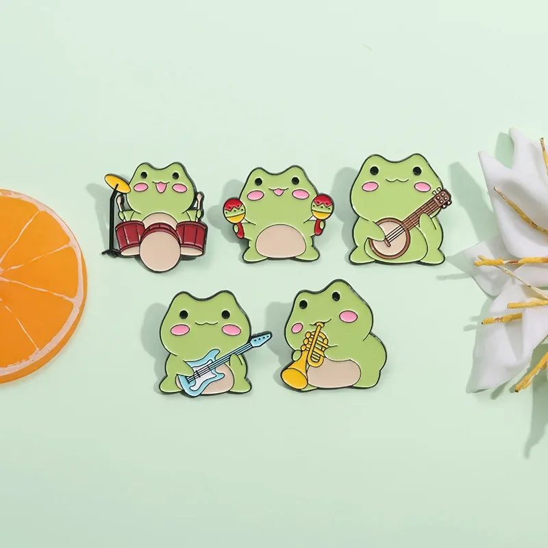Kawaii Cartoon Frog Band Enamel Pins 🎶🐸 | Fun Drum & Guitar Brooches for Kids & Friends 🎸✨ | Cute Lapel Badges & Jewelry Gift