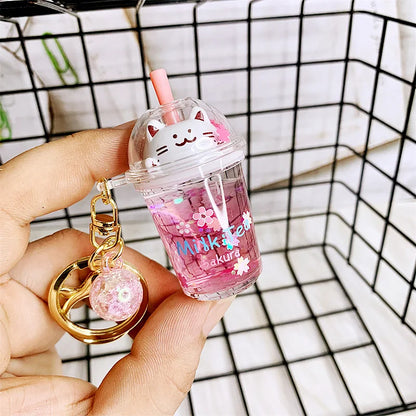 🌸 Cute Cat Milk Tea Keychain 🐱✨ Adorable Sakura Car Pendant Gift! - Pixie Quill
