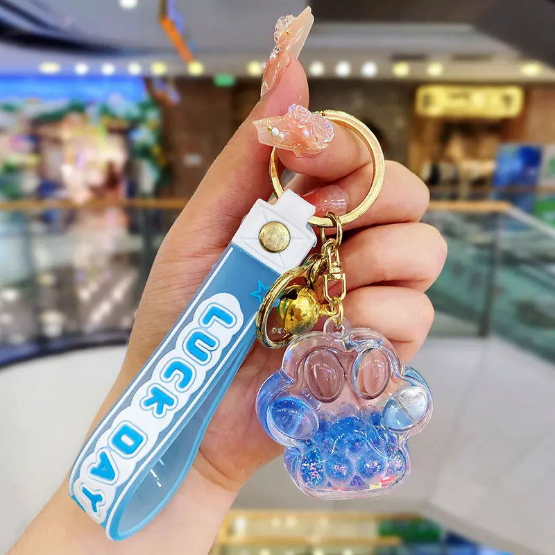 ✨ Cute Cat Claw Bubble Bead Liquid Flowing Sand Keychain Pendant 🌈 Perfect Friendship Gift for All! 🐾 - Pixie Quill