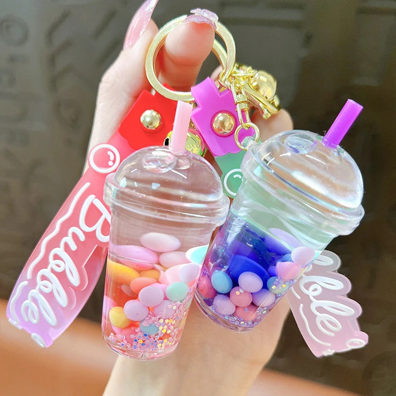 ✨ Adorable Quicksand Jelly Bean Keychain 🌈 - Whimsical Liquid Pearl Milk Tea Pendant for Trendy Bags & Keys! 🎀 - Pixie Quill