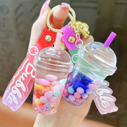 ✨ Adorable Quicksand Jelly Bean Keychain 🌈 - Whimsical Liquid Pearl Milk Tea Pendant for Trendy Bags & Keys! 🎀 - Pixie Quill